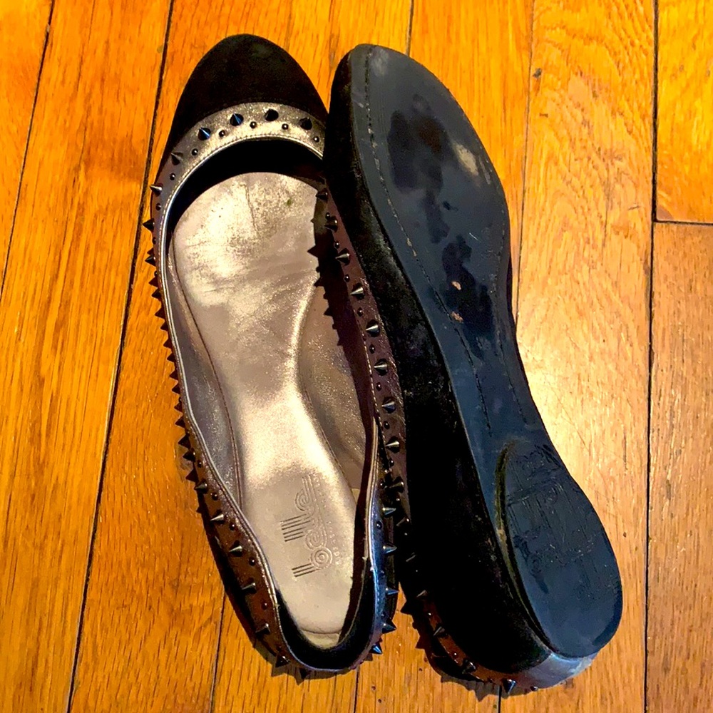 Belle suede flats with sliver leather trim and spikes.